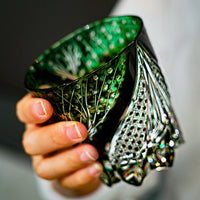 Light reflecting through Kaori Green Serpent Edo Kiriko whisky glass